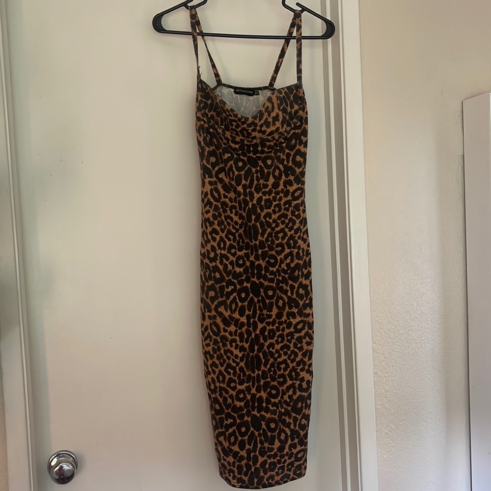 Pretty little thing stretch low cut leopard print maxi dress.